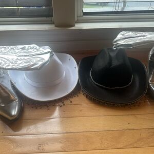 White and Black Cowboy Hats with Silver Details